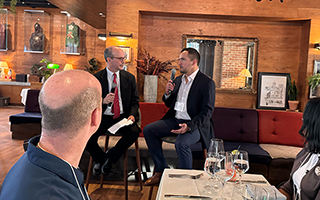 Aaron Munoz presenting at event